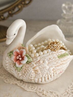 Elegant White Swan Figurine with Floral Accent
